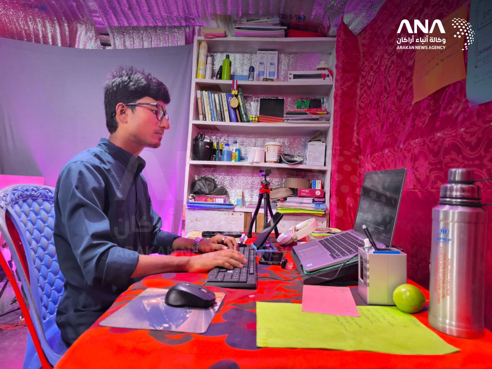Rohingya youth Yasor Arfat working on Skillvite inside his home in Bangladesh camps (Image: ANA)