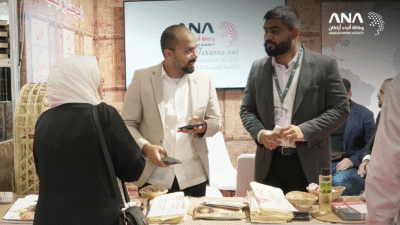 Volunteers at the booth of Arakan Humanitarian Association in the book fair (Image: ANA)