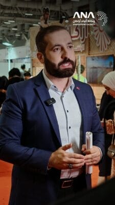 Turkish journalist Hamza Tekin talking to ANA after visiting the pavilion of Arakan Humanitarian Organization at the book fair, 16-8-2025 (Photo: ANA)